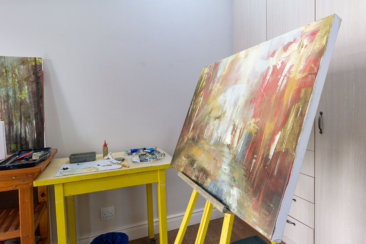 A painting in progress on Janet Dirksen's easel.